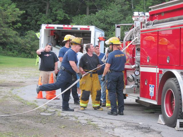 Craig Barry, and Andy McGill flanked by 3 New York State Fire Instuctors 8/11/2010